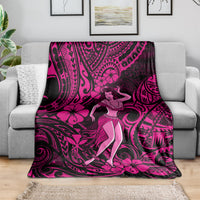 Pink and black hula girl blanket draped on couch, with polynesian swirls and flowers
