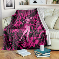 Pink and black hula girl blanket with polynesian pattern; one edge shows light gray backing