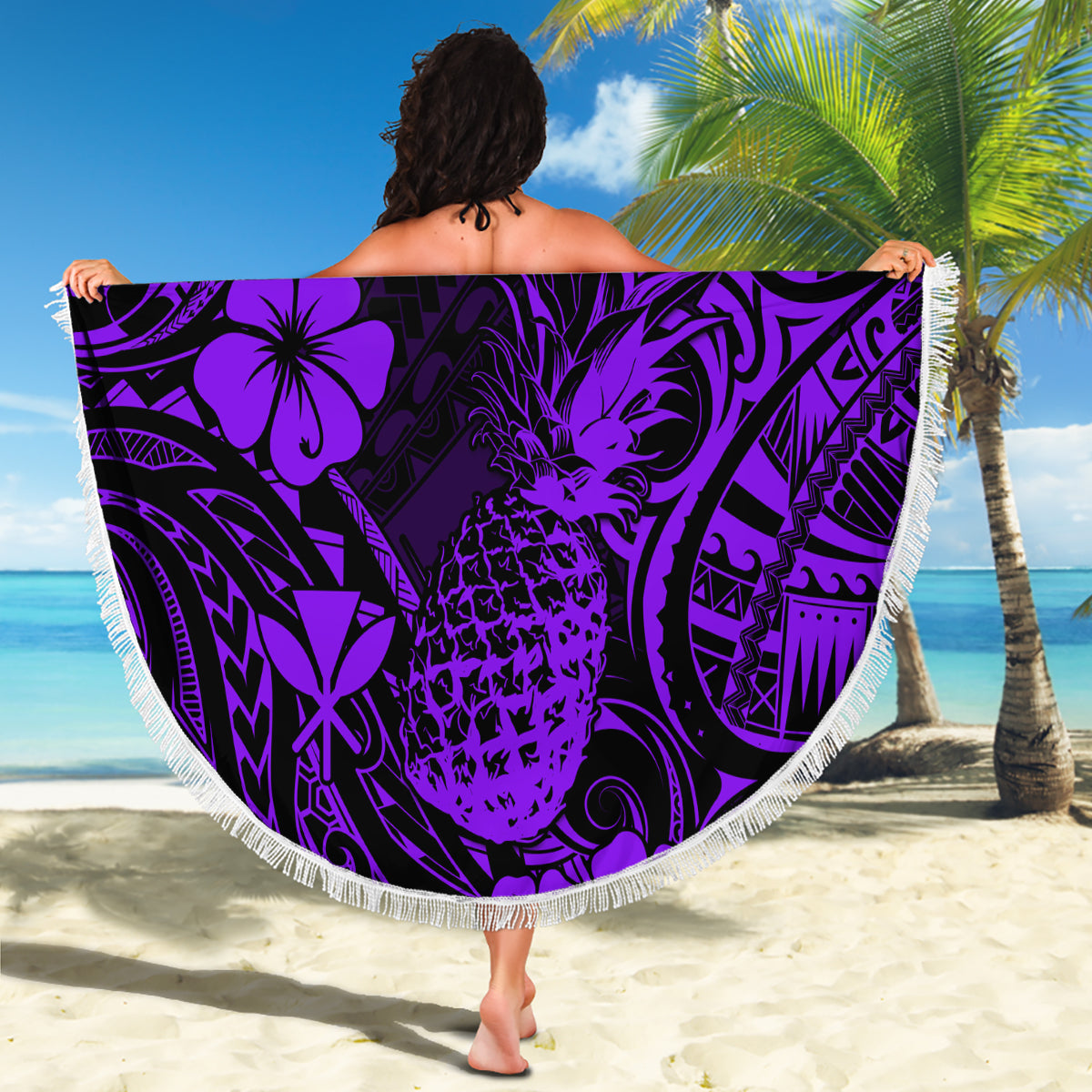 Purple round pineapple-pattern beach blanket with fringed edge and Polynesian tropical design