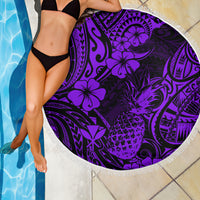 Purple round pineapple-pattern beach blanket with fringed border and Polynesian tropical print
