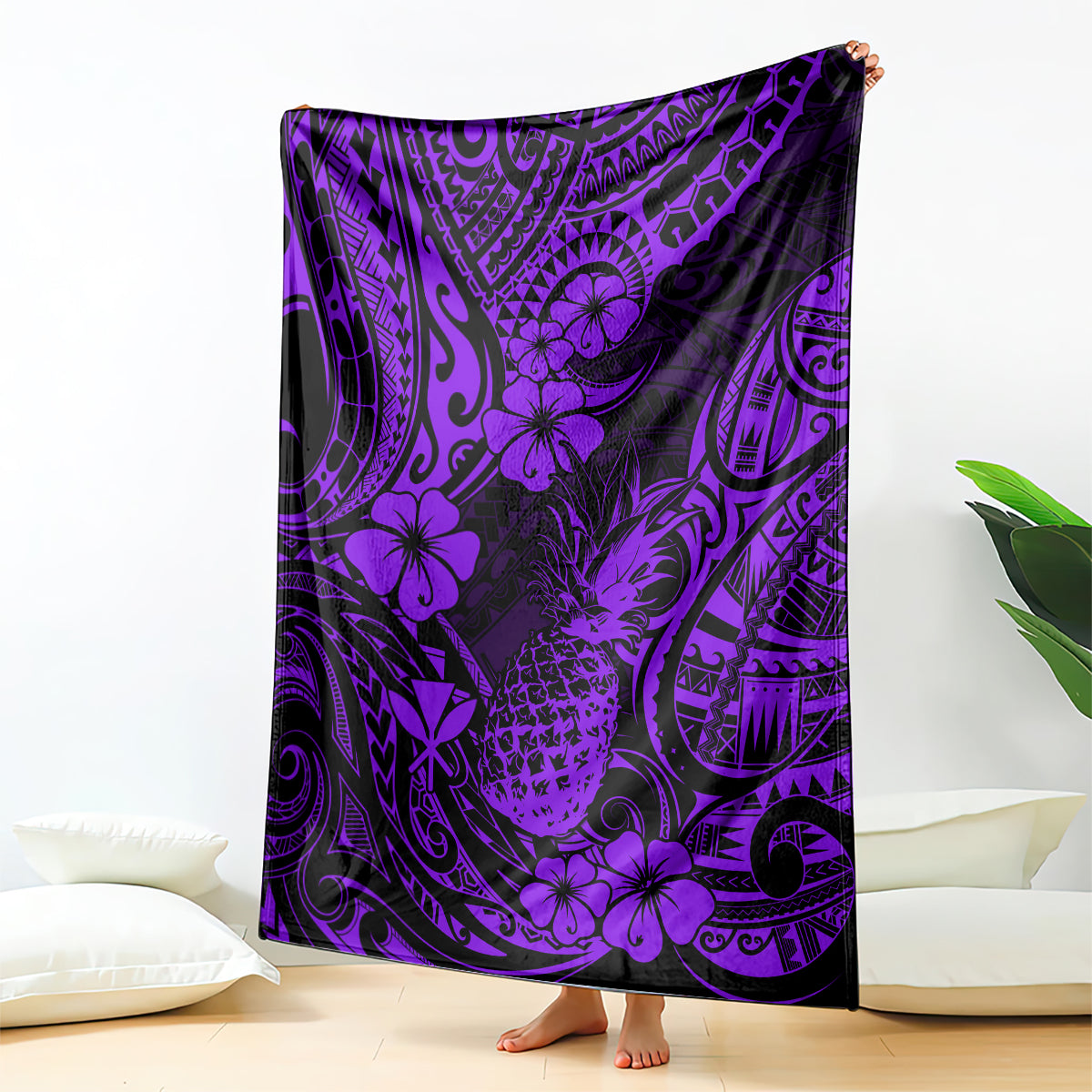 Purple Polynesian-style pineapple pattern blanket, draped and spread on a bed