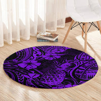 Purple round pineapple patterned rug with Polynesian tribal swirls and geometric accents