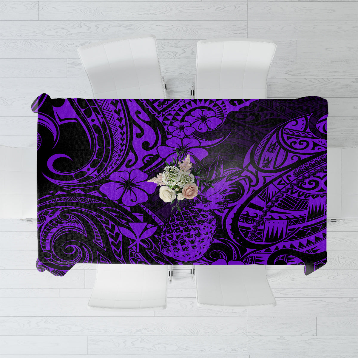 Purple tablecloth with black tropical tiki pattern, rectangular with straight edges