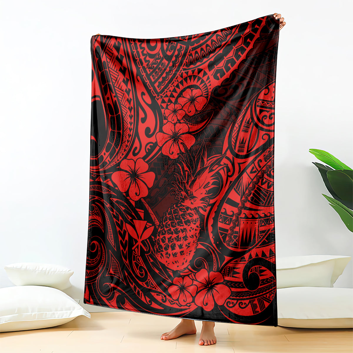Red and black Polynesian pineapple print throw blanket with tropical floral motifs