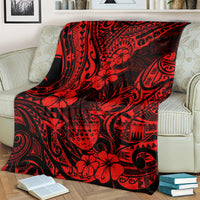 Red and black tropical pineapple-pattern throw blanket over couch