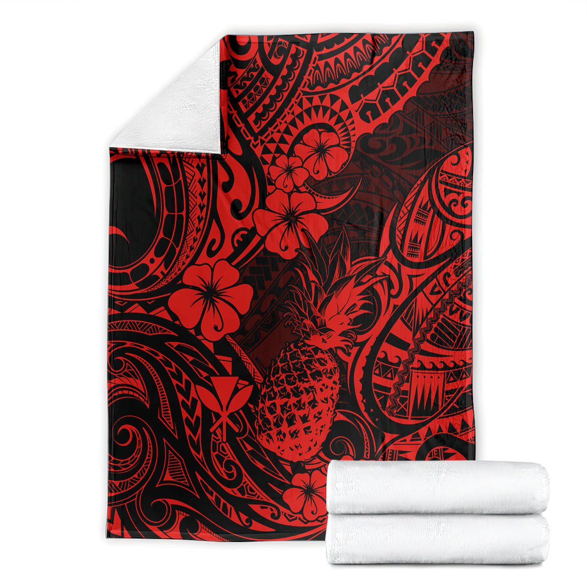 Red and black Polynesian pineapple print throw blanket with stacked white towels