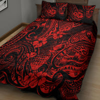 Red and black quilt bed set with swirled tropical floral pattern and two pillows