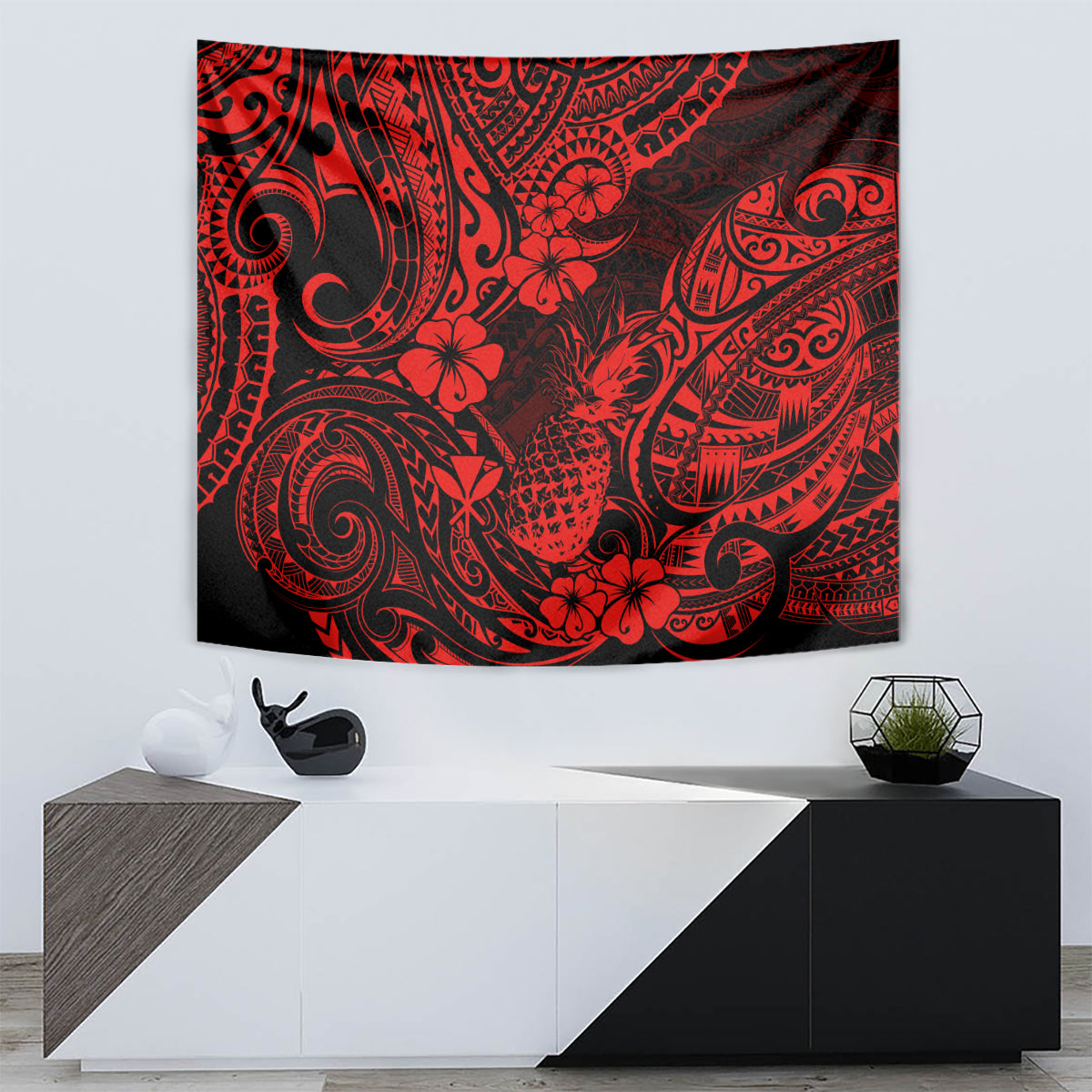 Red and black pineapple tapestry with intricate swirl, tiki, and floral pattern on wall