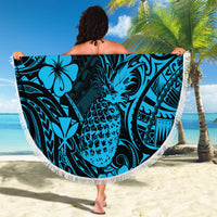 Round blue beach blanket with pineapple and tribal hibiscus pattern, white fringe edge