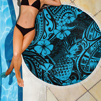 Round blue beach blanket with pineapple center and hibiscus pattern, white fringe border