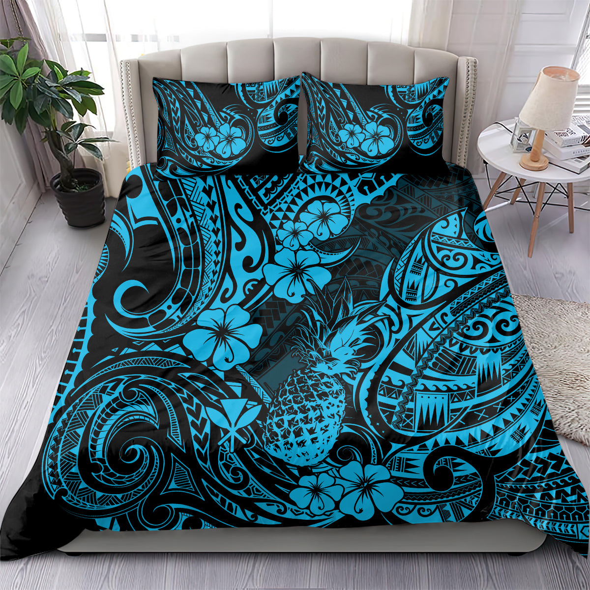 Blue and teal Polynesian-style bedding set with tropical floral and tribal pattern on bed