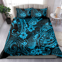 Blue and teal Polynesian-style bedding set with tropical floral and tribal pattern on bed