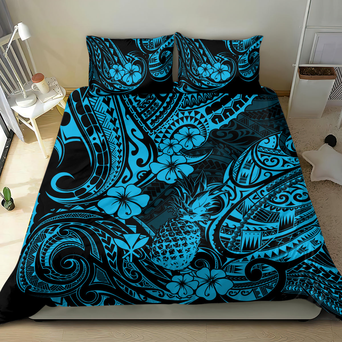 Blue and teal Polynesian-style bedding set with tropical floral and tribal pattern on bed