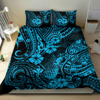 Blue and teal Polynesian-style bedding set with tropical floral and tribal pattern on bed