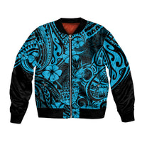 Unisex bomber jacket in sky blue tropical pattern with black sleeves and front zipper