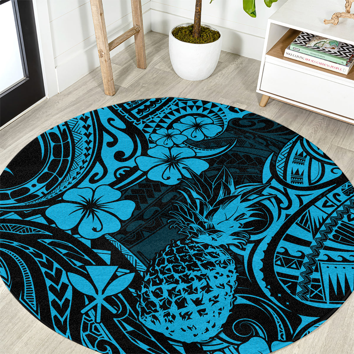 Round Polynesian pineapple pattern area rug in sky blue and dark navy