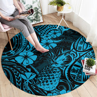 Round sky blue Polynesian pineapple motif rug with dark navy tribal designs
