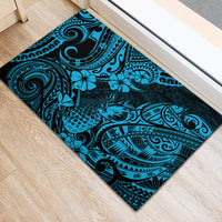 Blue rubber doormat featuring pineapple, hibiscus-style flowers, and Polynesian pattern