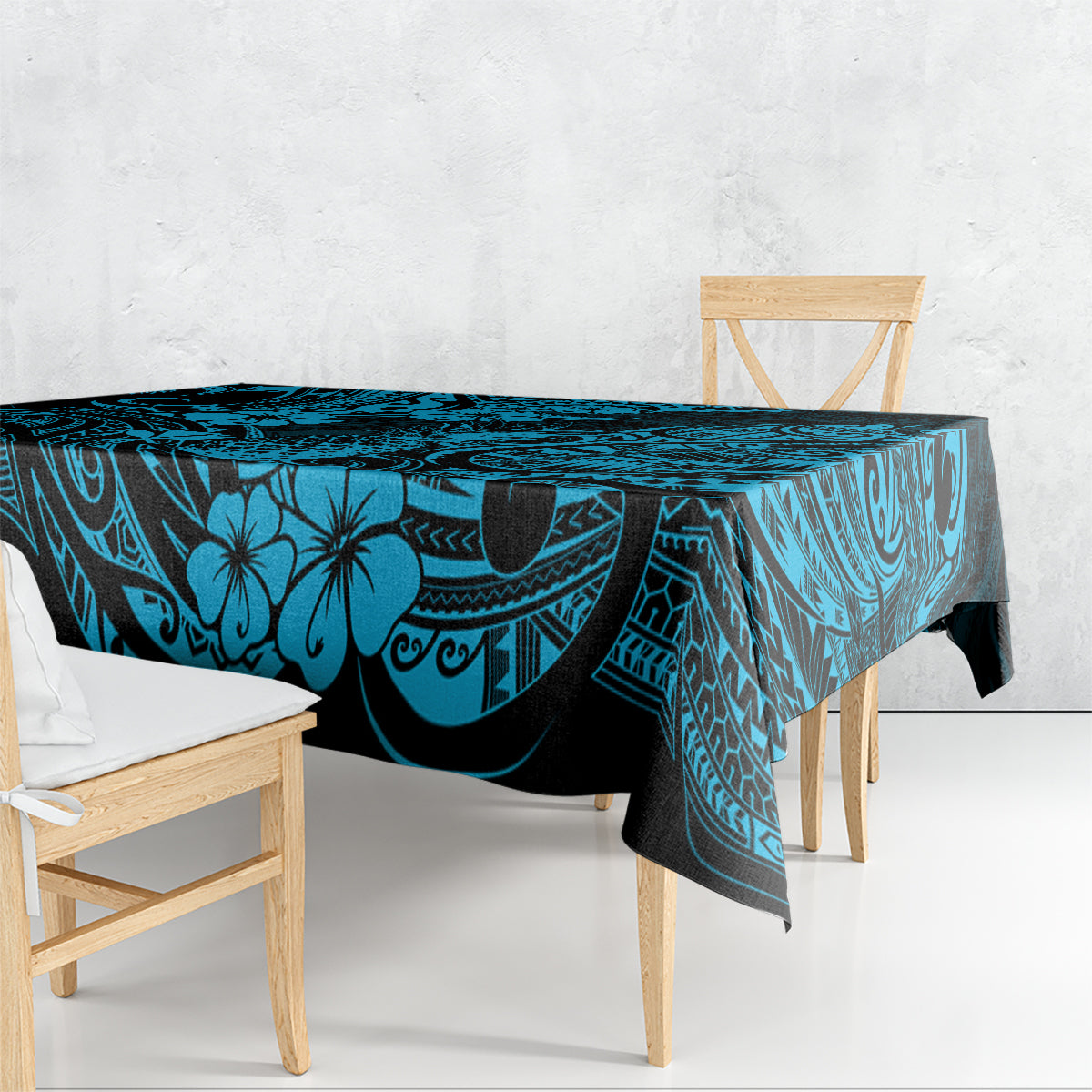 Blue polynesian tablecloth with pineapple and tiki-style motif on dining table
