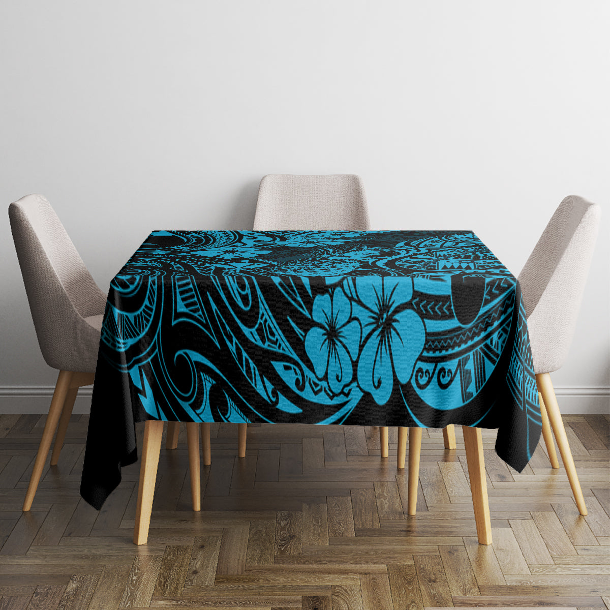 Blue polynesian tablecloth with pineapple and tiki-style design on dining table with chairs