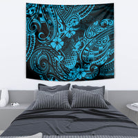 Blue pineapple tapestry wall hanging with ornate Polynesian swirl and floral design