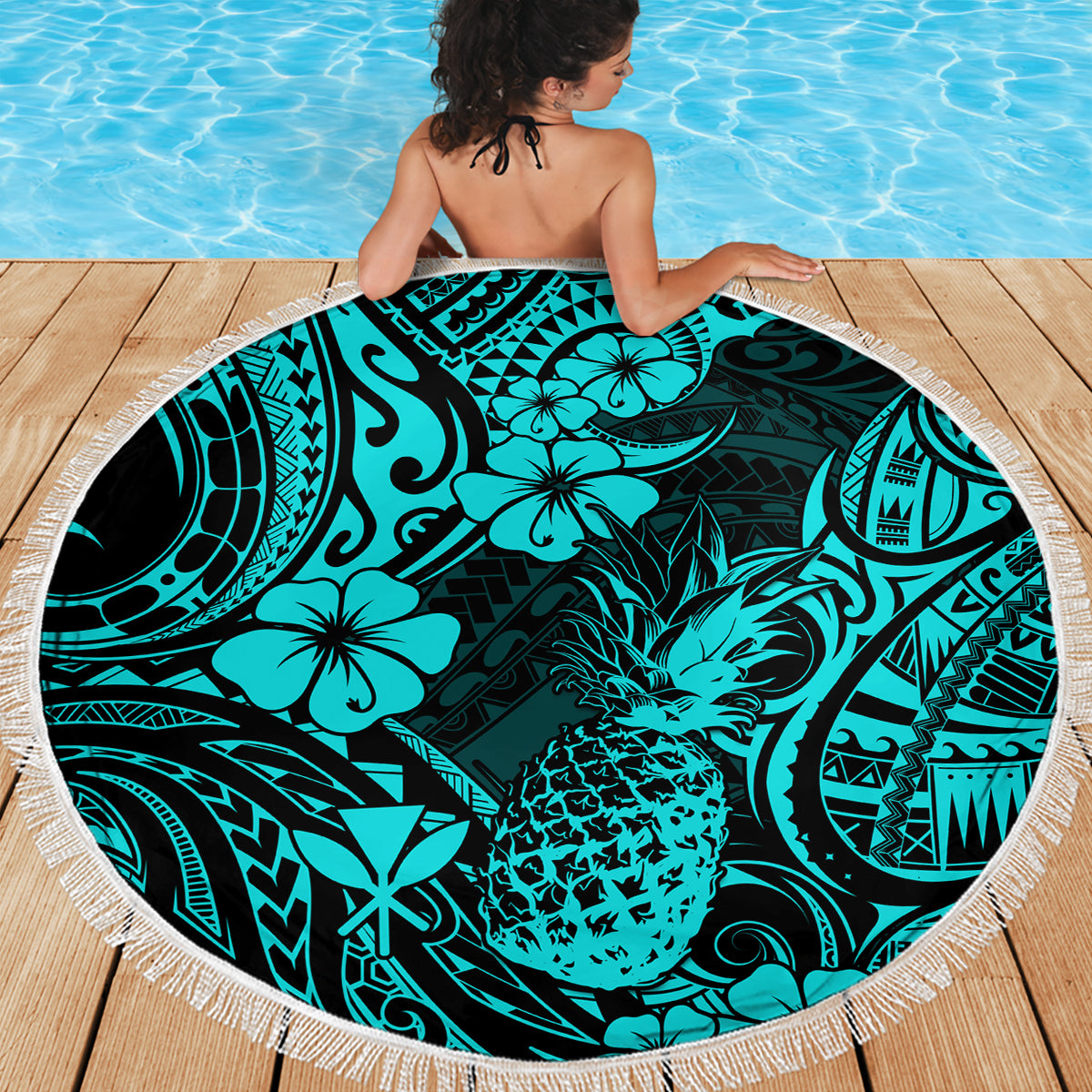 Turquoise pineapple beach blanket, round with white fringe edge and tropical pineapple motif pattern