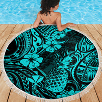 Turquoise pineapple beach blanket, round with white fringe edge and tropical pineapple motif pattern