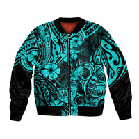 Unisex bomber jacket with turquoise tropical pattern, black sleeves and zip front