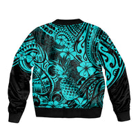 Unisex bomber jacket with turquoise tropical pattern on back, black ribbed hem