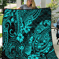 Turquoise Polynesian pattern quilt blanket with black background and tropical motifs