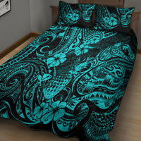 Turquoise quilt with Polynesian pineapple floral and swirl pattern, two pillow shams