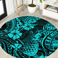Round turquoise pineapple and Polynesian pattern carpet with black ornamental accents