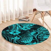 Round turquoise pineapple Polynesian pattern rug by white chair and light curtains