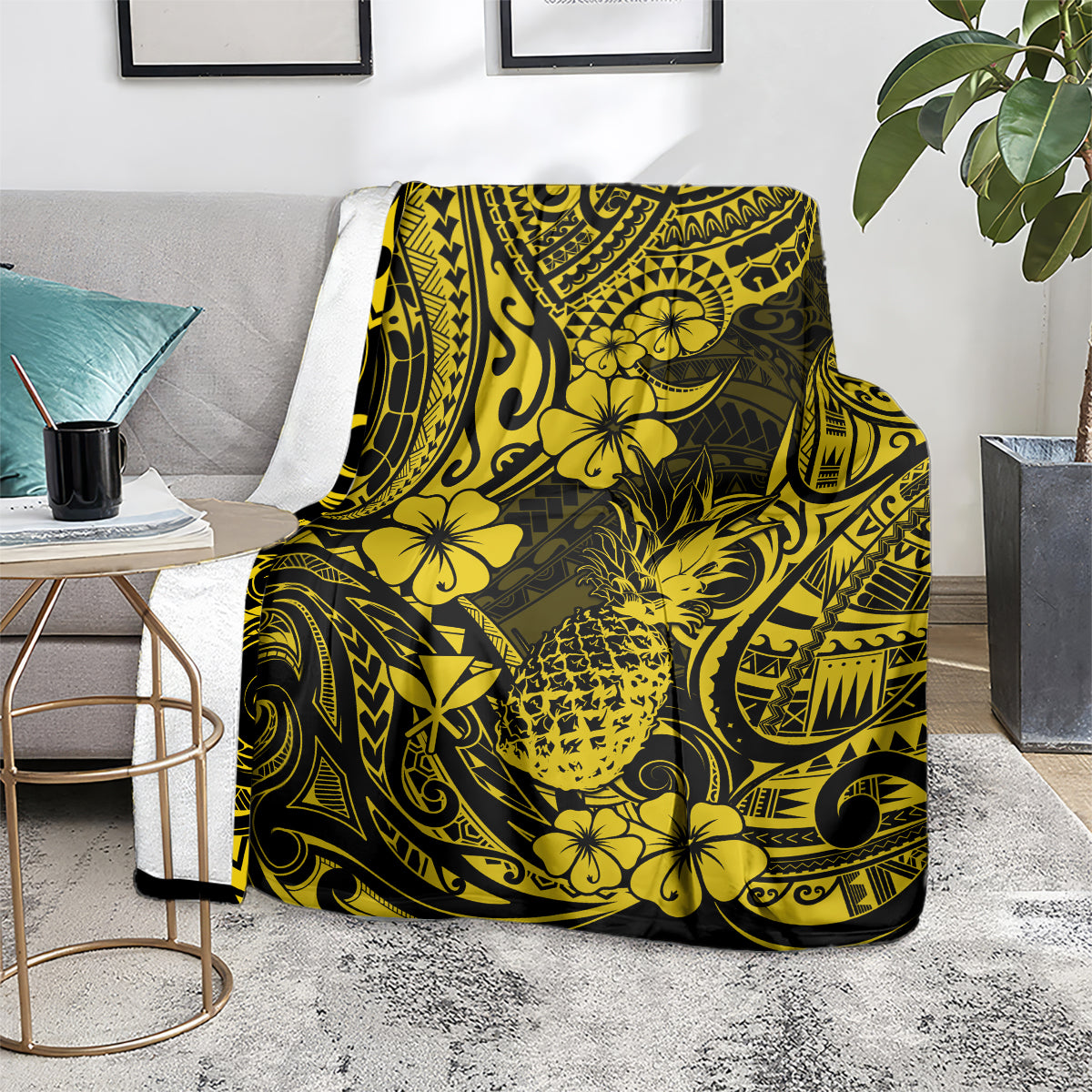 Yellow and dark pineapple floral tribal pattern blanket laid flat on the floor.