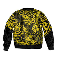 Yellow bomber jacket with black ribbed cuffs, pineapple and floral polynesian print