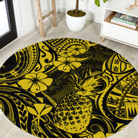 Round area rug with black base and yellow pineapple polynesian pattern