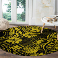 Round pineapple patterned area rug in yellow with black tribal wave designs