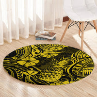 Round area rug with yellow pineapple artwork and black polynesian symbols