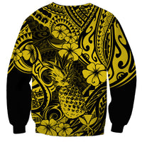 Unisex yellow and black sweatshirt with centered pineapple and floral Polynesian pattern