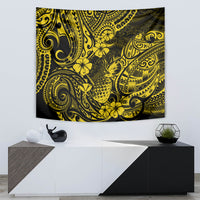 Yellow and black pineapple polynesian pattern tapestry framed by a wall mount