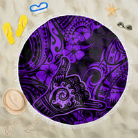 Round purple beach blanket with Polynesian-style pattern and white fringe edge