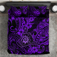 Purple Polynesian shaka and tiki pattern bedding set with hibiscus and swirling motifs