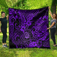 Purple and black quilt with bold Polynesian scrollwork and flower motifs