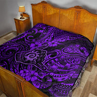 Purple and black Polynesian-pattern quilt with large ornate swirl and flower design