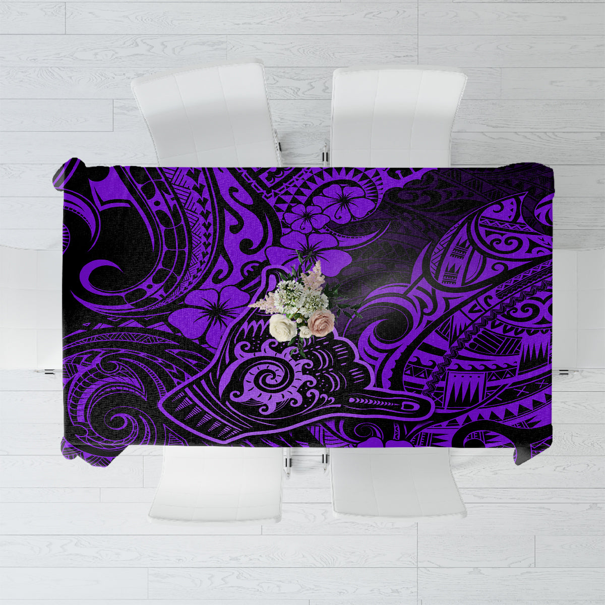 Purple tablecloth with black and purple Polynesian tiki swirl pattern