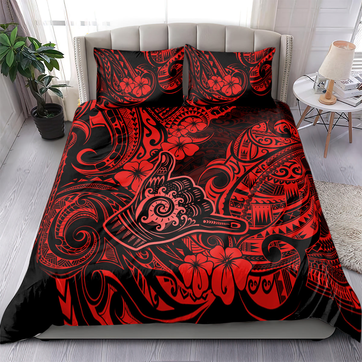 Red and black Polynesian-style duvet bedding set with two matching pillowcases, ornate print