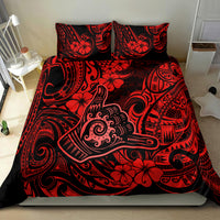 Red and black Polynesian-style bedding set duvet and two pillowcases with ornate motifs