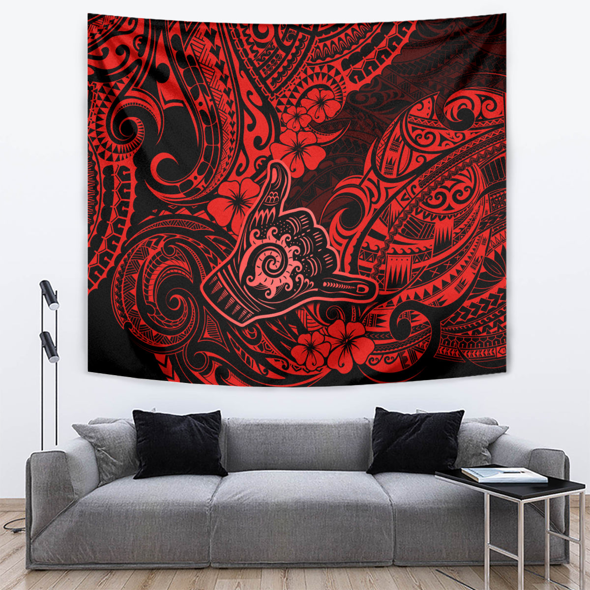 Red and black decorative tapestry with tribal swirl motifs and flower accents