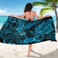 Polynesian patterned sarong wrap, dark blue with turquoise scrolls and floral motifs
