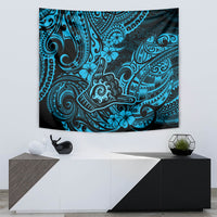 Blue Polynesian style tapestry featuring tribal motifs and hibiscus flowers
